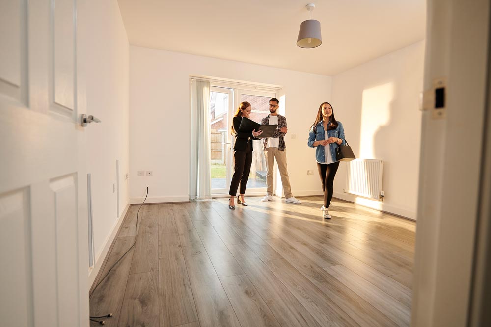 Realtor showing a house for sale